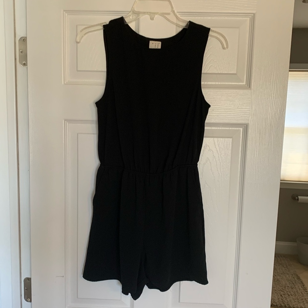 Partial open back romper